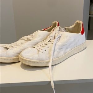 Adidas red and white sneakers